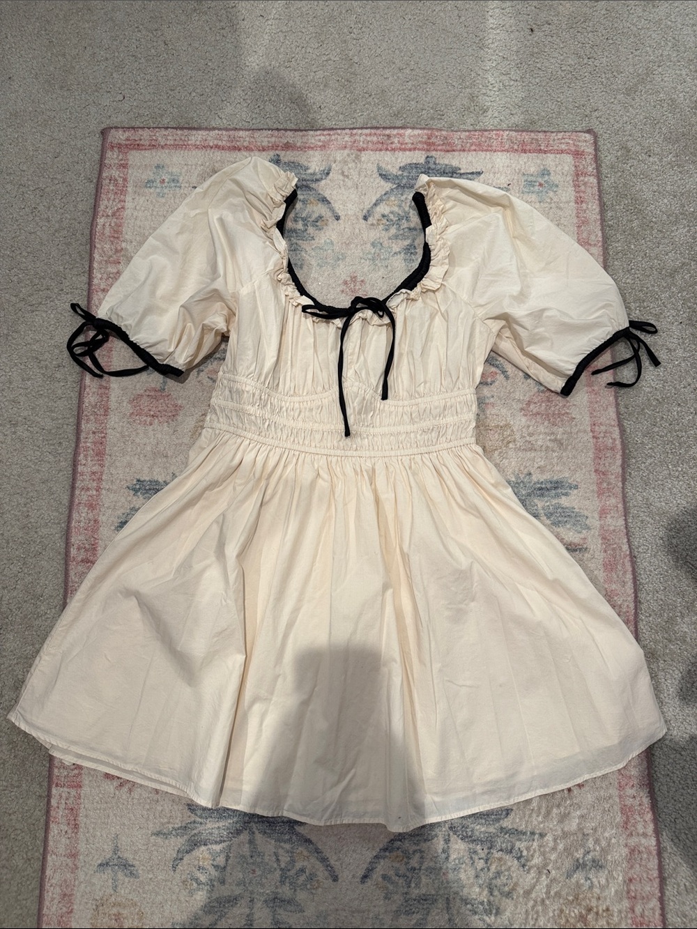 American Eagle cream cotton smocked fit and flare mini dress with bow details